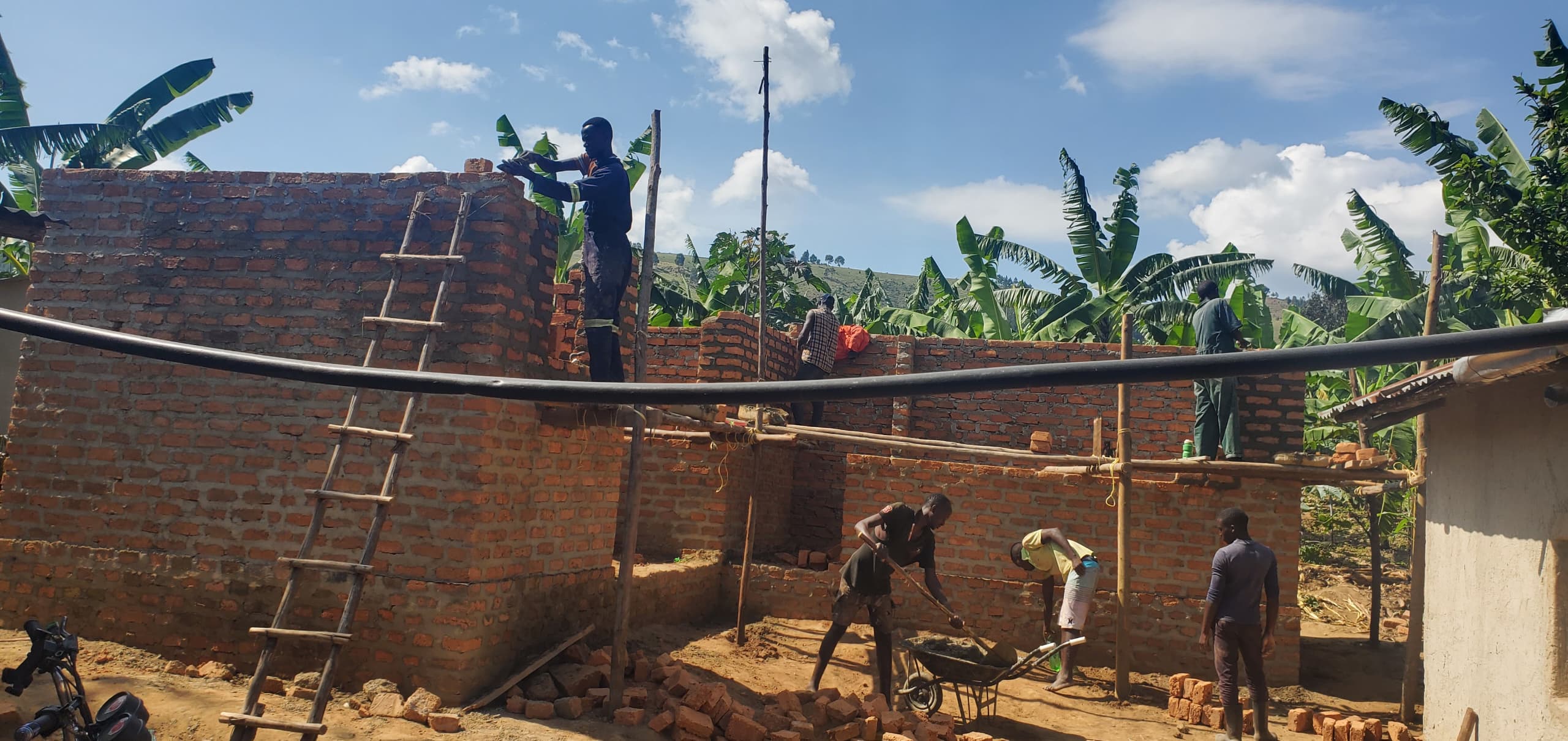 Workers building a community facility